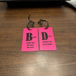 Inventive Travelware 2 Luggage Tags Funny "Drop it" & "Another bag" Hot Pink